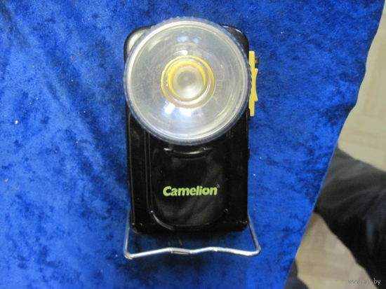 Фонарик Camelion.