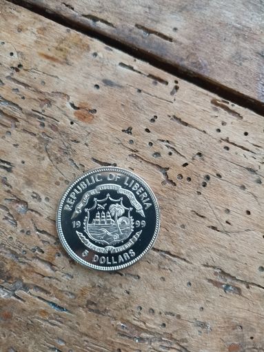 ЛИБЕРИЯ   5   долларов  1999 год.           / шайба /