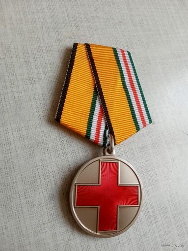 Медаль. За помощь в бою.