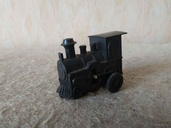 Детская механическая заводная игрушка-паровозик. СССР, вторая половина прошлого века.