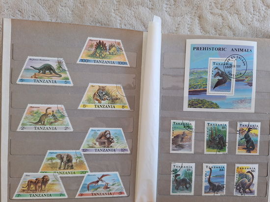 Альбом с марками - Динозавры - марки разных стран мира