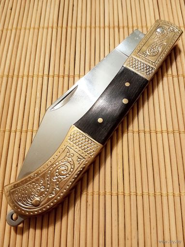 Новый нож золотистый складной