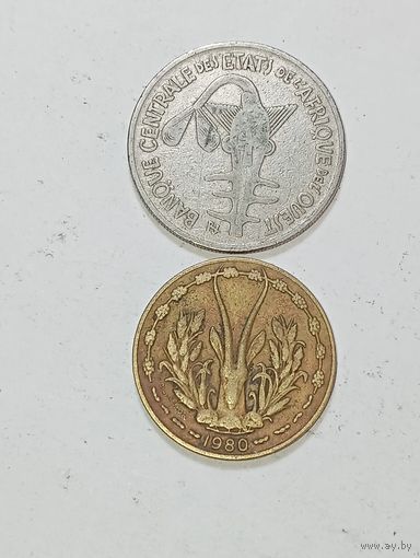 Западная Африка 10 франков 1980 и 100 франков 1975 года .