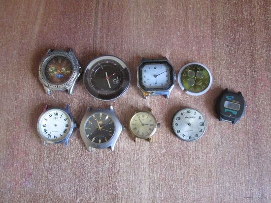 Механизмы и запчасти часов.