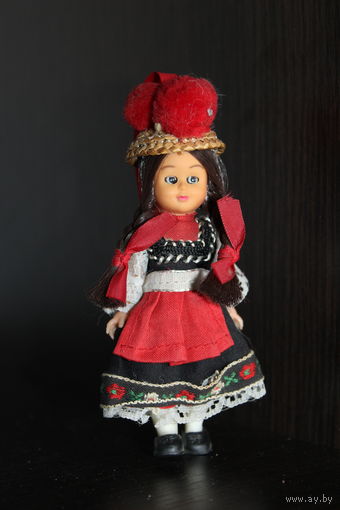 Ёлочная, пластиковая игрушка в виде куклы.