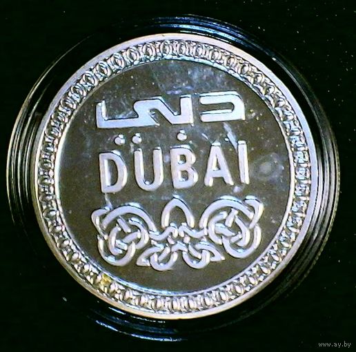 Сувенирный жетон (медаль), посвященная Дубаю и изображающая небоскреб Бурдж-Халифа, самое высокое здание в мире