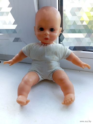 Пупс с мягким телом туловищем около 26-27 см , на затылке цифры 11