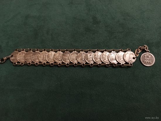 Винтажный сувенирный браслет из Франции с изображением Эйфелевой башни и других достопримечательностей Парижа , коллекционный объект 1950-х годов.