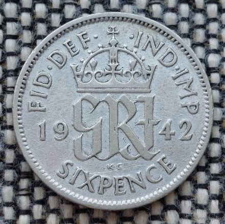 Великобритания 7 пенсов 1942 года. Король Георг VI. Серебро! Сторгуй за свою цену, предложи обмен!