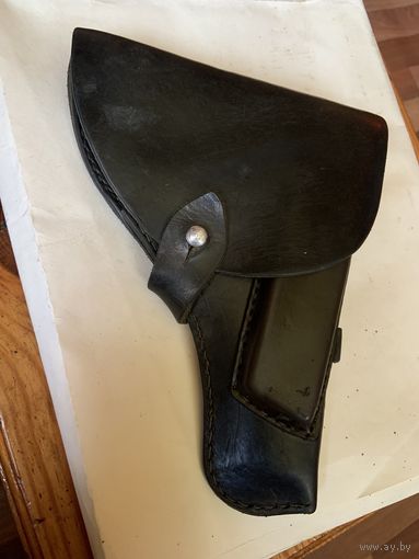 Комбинированная-как для "ТТ" так и для"Наган" и возможно даже ПМ постсоветская кабура из толстой и мягкой кожи.