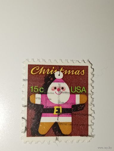 США 1979 На марке изображен Санта-Клаус в виде пряничного человечка.