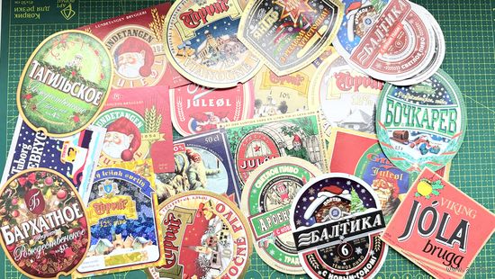 Этикетки от алкогольных, слабоалкогольных и безалкогольных напитков. Тема- Новый год. все разные, более 180 шт. на фото не все этикетки...