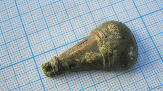 Половинка древней привески. Бронза, литье.