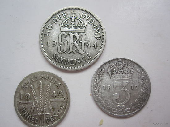 Серебряные монеты 3 пенса 1917г.Великобритании,3 пенса 1949г.Австралии и 6 пенсов 1944г. Великобритании.