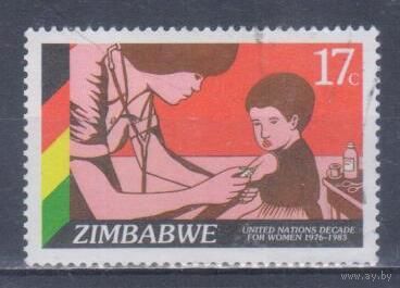 [1521] Зимбабве 1985. Дети.Прививка у врача. Гашеная марка.