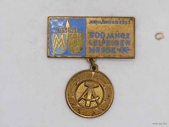 Знак. Значок. "800 лет Лейпцигской ярмарке". ГДР. Германия 1965 г. Ретро СССР. Фестиваль. Выставка. м