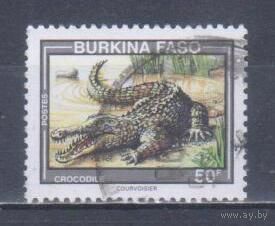 [1610] Буркина Фасо 1995. Фауна.Рептилии.Крокодил. Гашеная марка.