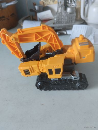 Экскаватор игрушка Трансформер.