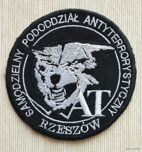 Шеврон 103-3, Польша