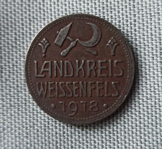 Немецкая монета номиналом 10 пфеннигов 1918 года, выпущенная в качестве нотгельда (экстренных денег) для района Вайсенфельс.