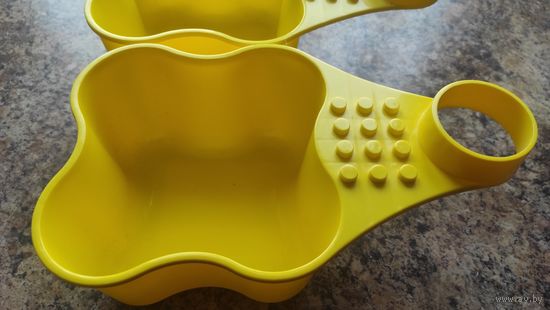 Детский контейнер для хранение на ножку стула Икеа. Новый. В наличии 2 штуки. Цена 12.00 за две штуки 20,00