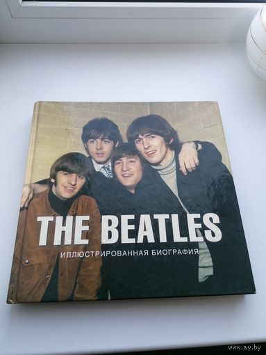 Книга иллюстрированный альбом The beatles