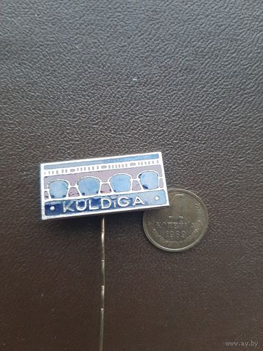 Значок Колдига