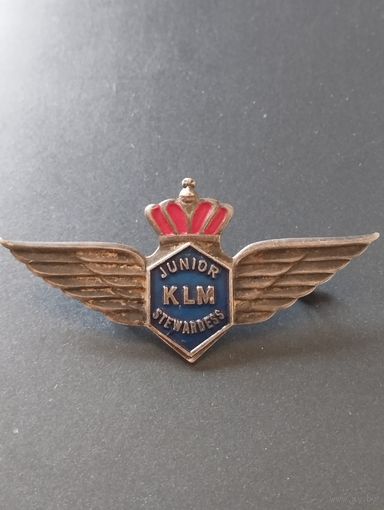 Знак стюардессы голландской авиакомпании KLM.