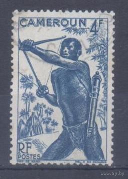 [1142] Французские колонии. Камерун 1946. Культура и быт.Охотник с.луком. Гашеная марка.