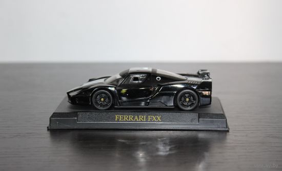 Металлическая, коллекционная машинка "FERRARI FXX", на пластиковой подставке, клеймо, Китай.