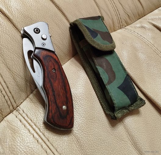 Нож выкидной