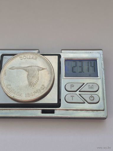 1 доллар Канада 1967 года, Королева Елизавета II (1953 - 2025). 100 лет Конфедерации Канада. Серебро 800. Монета не чищена. В45511