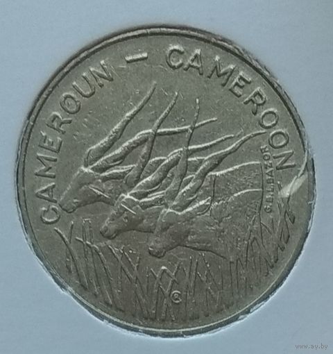 Камерун 100 франков 1975 г. В холдере