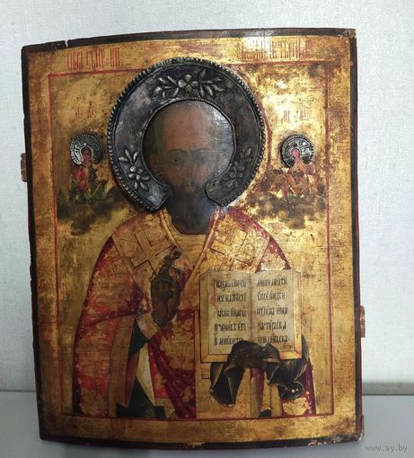 Икона " Николай Чудотворец ". 19-й век. По сусальному золоту. Венцы Серебро. Пробы не стоят. Размер иконы 48.5 на 39 см. Отличное письмо. Состояние  хорошее